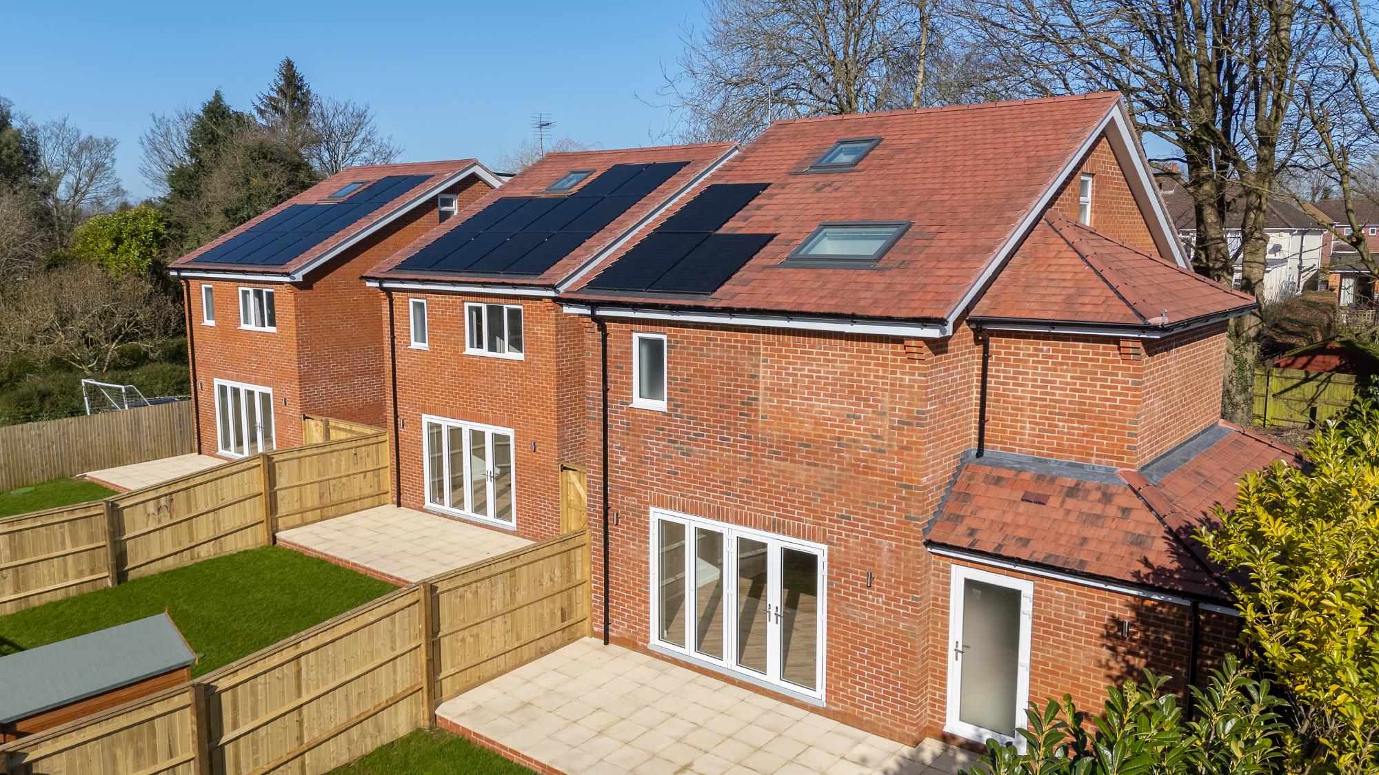 Three%20red%20brick%20houses